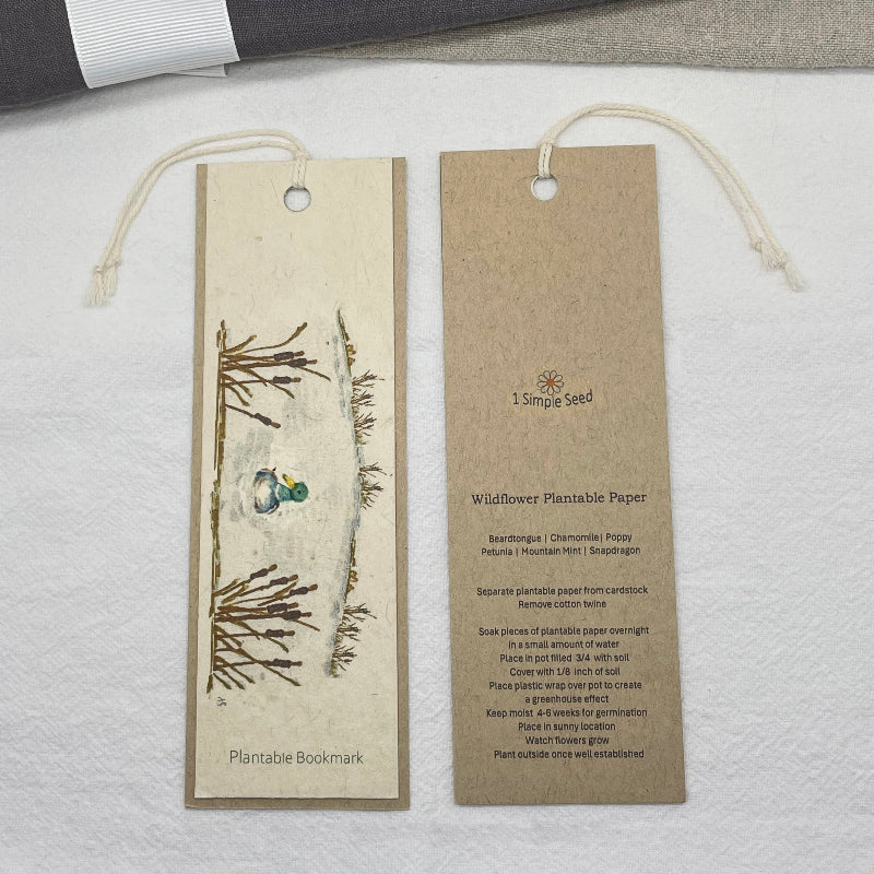 plantable book mark. wildflower seed paper. duck on lake. adventure. outdoor.