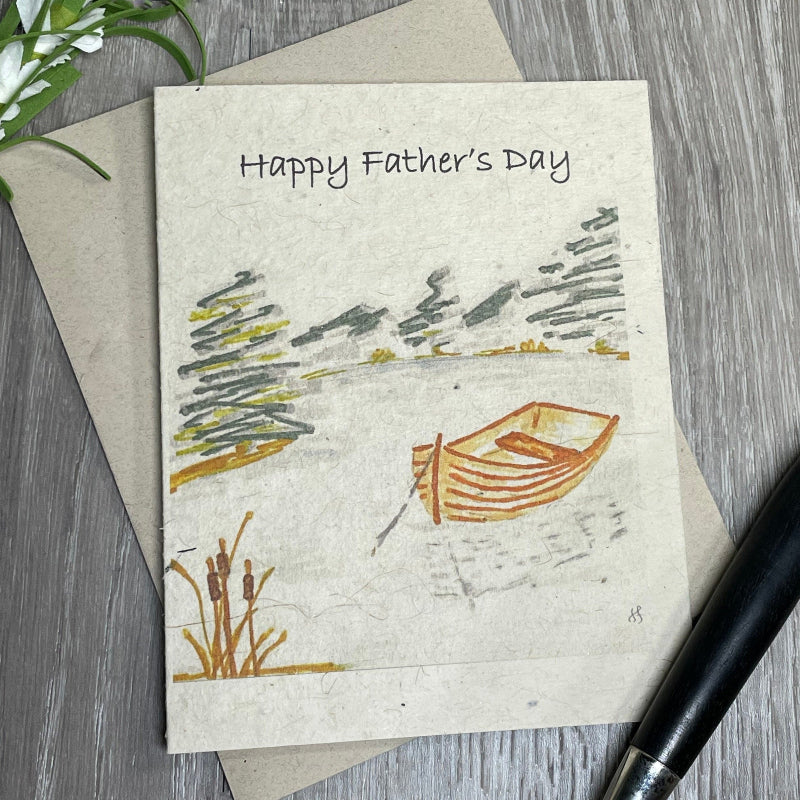 fathers day. boat on lake. plantable seed paper.