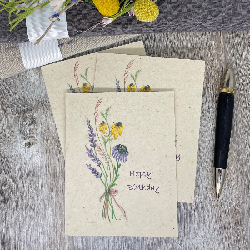 Handmade birthday card with floral design and 'Happy Birthday' . plantable seed paper.