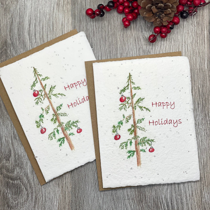 holiday christmas card with a tree on it. Plantable card grows wildflowers.  Plantable card. Wildflower seed paper. Christmas Tree.  Holiday Card.Bulk.