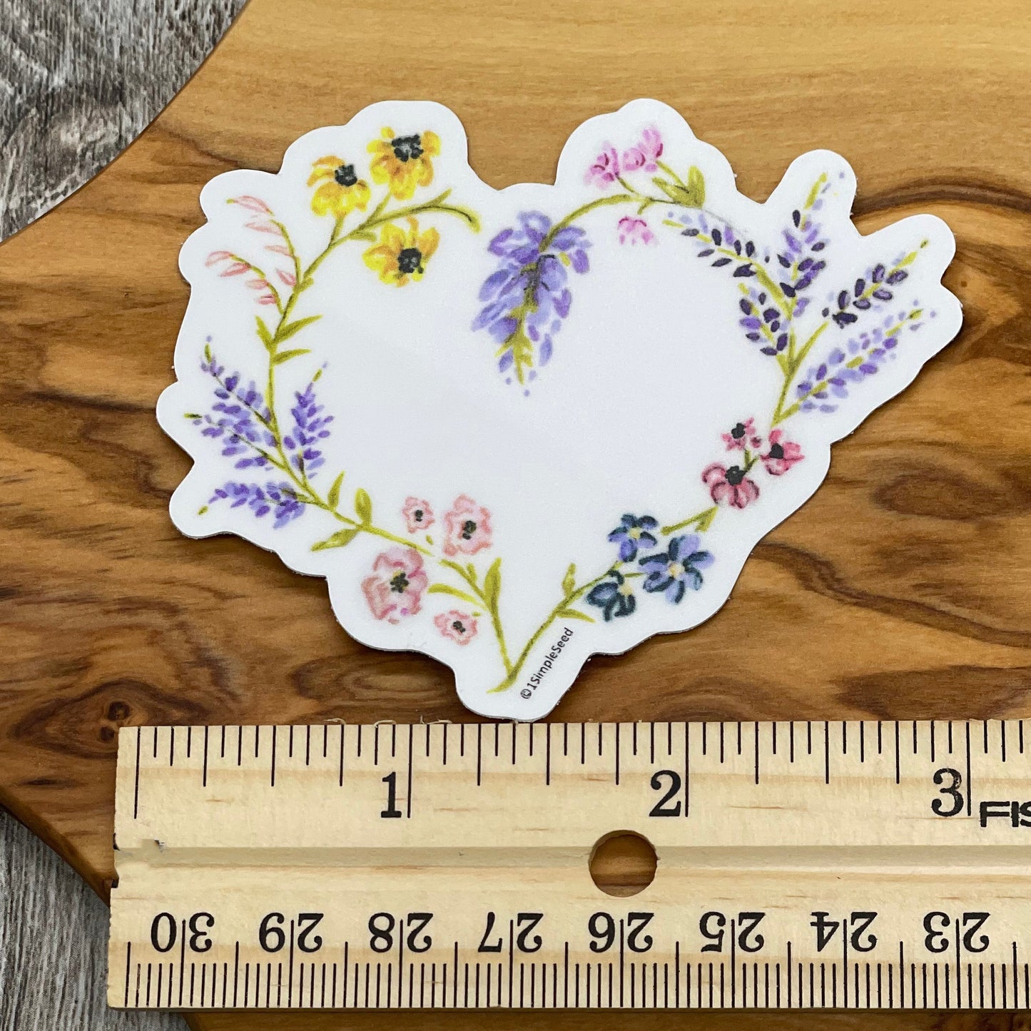Show off this pretty wildflower heart sticker on your water bottle, laptop, phone or notebook.  Our stickers are colorful and made to last.

🌺Size & Information:
    -3" x 2.52"
    -Dishwasher and microwave safe
    -2-4 year outdoor life (UV resistant, weatherproof, waterproof, scratchproof & fadeproof)

🌺Application Instructions:
    Remove paper backing and apply at a moderate temperature (50º-80º F) to a clean and dry surface. 

🌼Shop our matching Plantable Greeting Card: https://www.etsy.com/listin